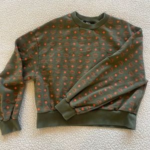 Unisex MCM crop sweatshirt. Olive green and orange.